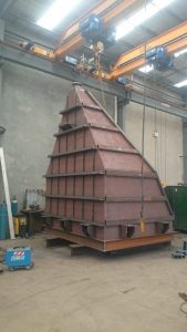large triangular metal chute